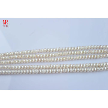 5-6mm White Freshwater Pearl Strands, Button Round (ES117)